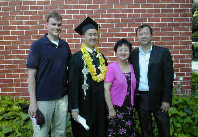 Victor Tam with his parents, Patricia and Tom Tam, and Professor Matt Francis